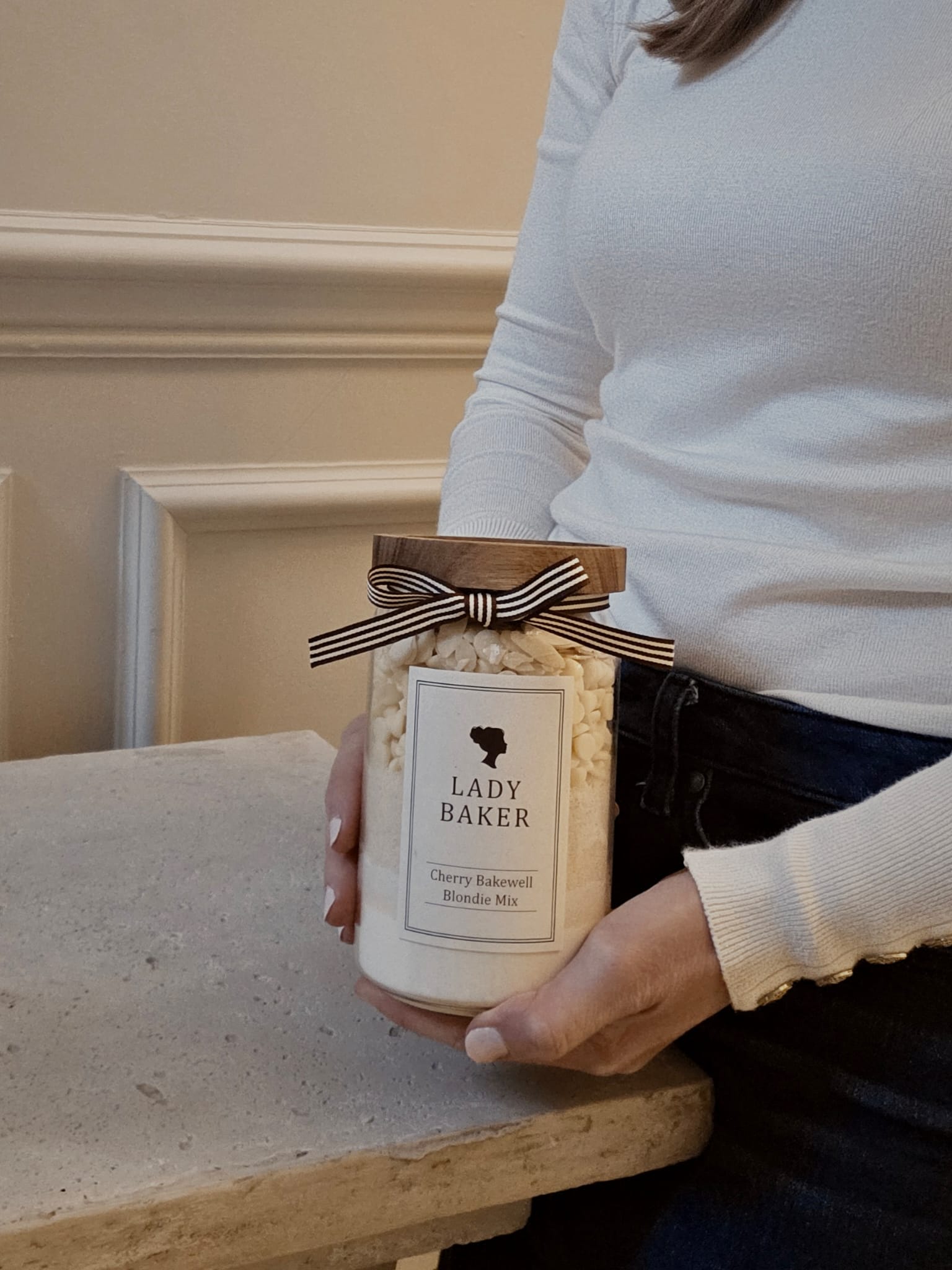 Cherry Bakewell Blondie Mix jar held in hands - Lady Baker baking jar gift.